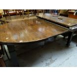 ARTS & CRAFTS STAINED ELM EXTENDING DINING TABLE with three extra leaves overall, 200cms long