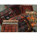 ASSORTED TRIBAL SADDLE BAGS including Baluch examples (6) Condition Report: all with insect damage
