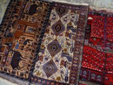 ASSORTED TRIBAL SMALL RUGS including Afghan pictorial rug with camel, all around 140 x 92cms (3)