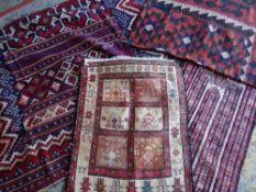 FOUR TRIBAL FLAT WOVEN RUGS including a Shahsevan Soumak and a Turkish Kilim (4) Condition Report: