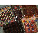 ASSORTED TRIBAL SADDLE BAGS including Baluch and a tent bag (5) Condition Report: all with insect