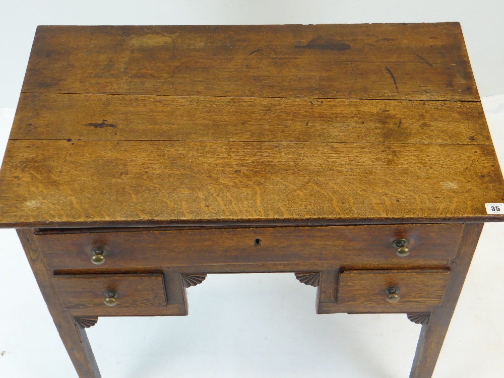 18TH CENTURY OAK LOWBOY, fitted three drawers, carved fan shaped spandrels, 83cms wide - Image 2 of 2