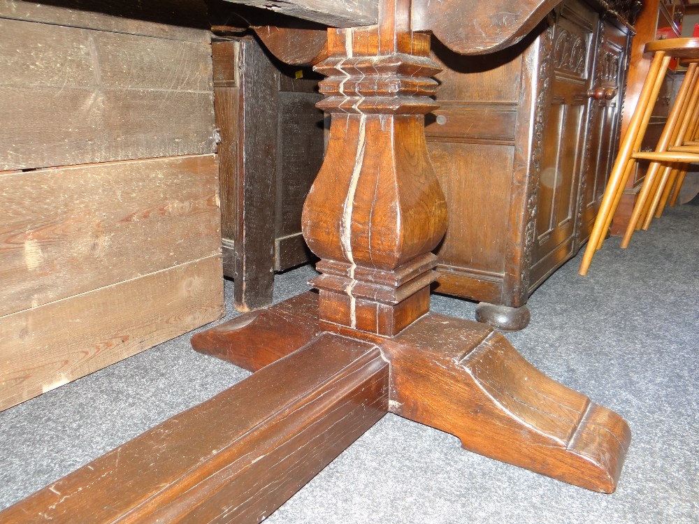 ANTIQUE ELM REFECTORY TABLE the four plank top with cleated ends on square baluster trestle end - Image 15 of 15