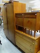 WHITE & NEWTON MID-CENTURY TEAK BEDROOM SUITE comprising wardrobe, pair of bedside cabinets, four-
