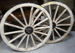 PAIR OF VINTAGE BLACK & WHITE PAINTED WAGON WHEELS, 72cms diam. (2)