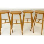 SET OF FOUR ERCOL-STYLE ELM & BEECH BAR STOOLS, tall legs joined by H-stretchers (4)