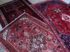 ASSORTED ORIENTAL TRIBAL RUGS including a Shirvan, largest 270 x 158cms (3) Condition Report: all