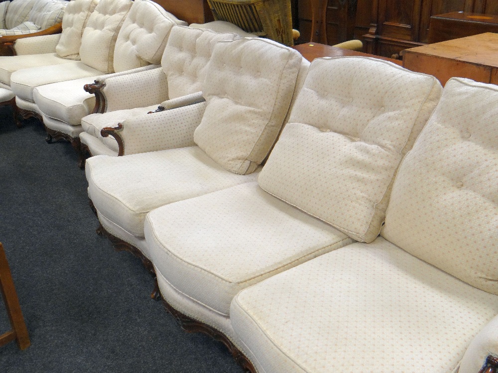 FRENCH LOUIS XV-STYLE WALNUT SALON SUITE comprising two three-seater sofas and a matching armchair
