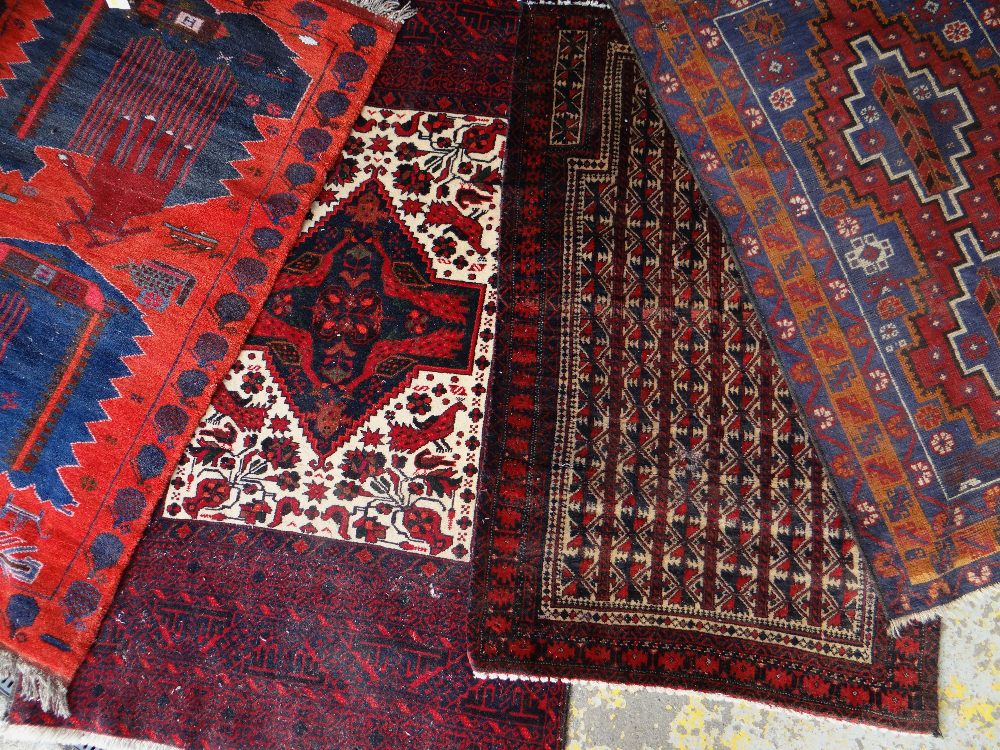 ASSORTED ORIENTAL TRIBAL SMALL RUGS including interesting Afghan 'war' rug featuring helicopters and