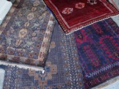 ASSORTED TRIBAL RUGS including a red Qashqai signed and dated in the field, all approx. 210 x 133cms