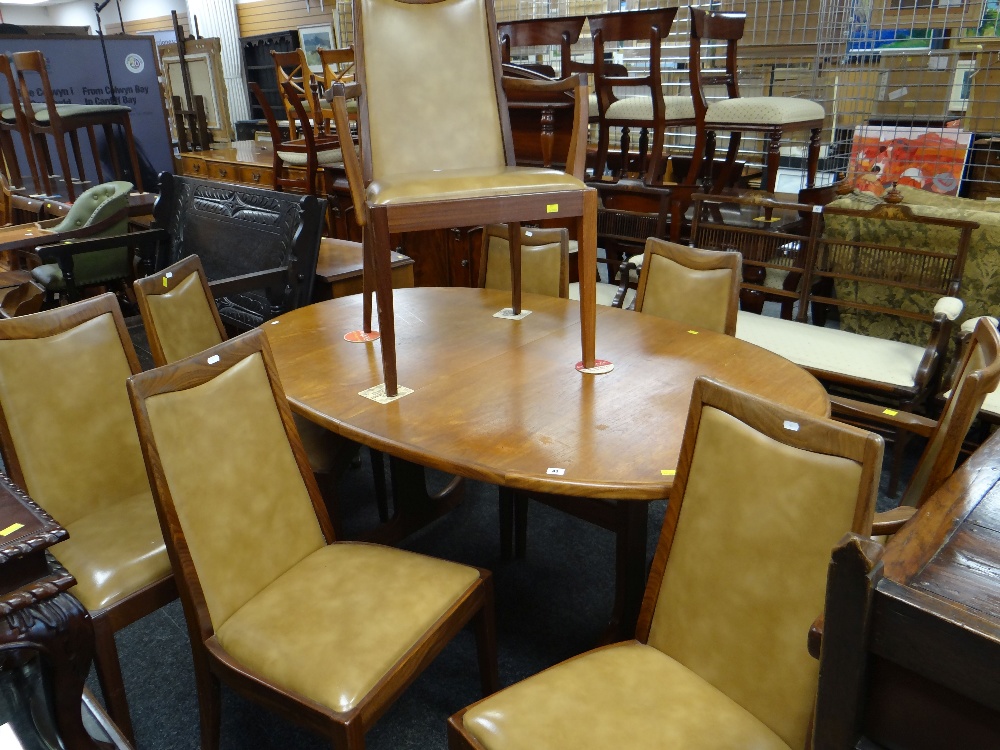 G-PLAN TEAK OVAL EXTENDING DINING TABLE & SET OF EIGHT 'FRESCO' DINING CHAIRS all with red G-Plan