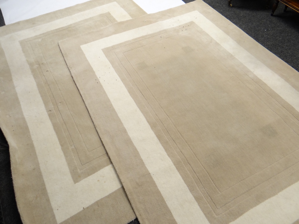 PAIR OF LAURA ASHLEY WOOL RUGS, caramel with cream borders, 261 x 180cms (2) Condition Report: