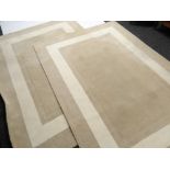 PAIR OF LAURA ASHLEY WOOL RUGS, caramel with cream borders, 261 x 180cms (2) Condition Report:
