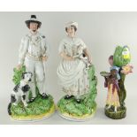 PAIR OF VICTORIAN STAFFORDSHIRE FLAT BACK FIGURES OF SHEPHERD & SHEPHERDESS, 41cms high and Austrain