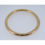 9CT YELLOW GOLD BANGLE, 23.9gms