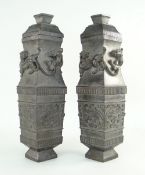 PAIR OF CHINESE BRONZE VASES & COVERS, of lozenge section, with chilong dragon necks and taotie