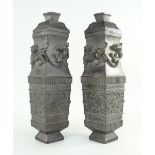 PAIR OF CHINESE BRONZE VASES & COVERS, of lozenge section, with chilong dragon necks and taotie