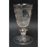 19TH CENTURY ENGRAVED GLASS GOBLET decorated with six putti on seesaws and beside grapevine above