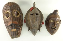 THREE AFRICAN MASKS including Kete mask 44cms high, Bamana mask 41cms high and Kongo mask 27cms high