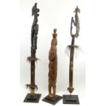 RAMU ANCESTOR FIGURE AND TWO IATMUL SPIRIT FLUTES, Sepik River Region, Papua New Guinea, 98cm, 132cm