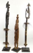 RAMU ANCESTOR FIGURE AND TWO IATMUL SPIRIT FLUTES, Sepik River Region, Papua New Guinea, 98cm, 132cm