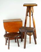 ARTS & CRAFTS-STYLE OAK TRIPOD FERN STAND together with two small milking stools (3)