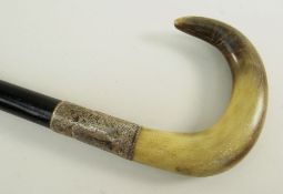 EARLY 20TH CENTURY SILVER MOUNTED RAM'S HORN WALKING CANE, silver collar engraved and dated 1935,