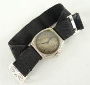 14K WHITE GOLD 'LADY ELGIN USA' LADIES WRISTWATCH on Petersham strap, the inside back cover numbered