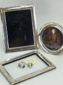 THREE SILVER PHOTOGRAPH FRAMES, miniature trophy cup and acorn shaped baby teether with ring (5)