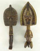 TWO KOTA RELIQUARY GUARDIAN FIGURES with copper sheet faces, largest 49 cms high (2)