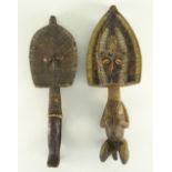 TWO KOTA RELIQUARY GUARDIAN FIGURES with copper sheet faces, largest 49 cms high (2)