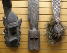 THREE VARIOUS AFRICAN MASKS including Mossi risian crest mask 118cms, Dogon antelope plank mask