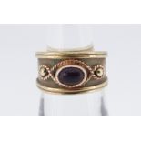 9CT YELLOW GOLD RING SET WITH CABOCHON AMETHYST, 8.3gms