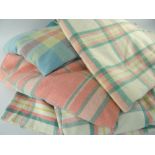 FOUR VINTAGE WOOLLEN BLANKETS, generally woven in cream, green, pink, yellow and blue ETC (4)