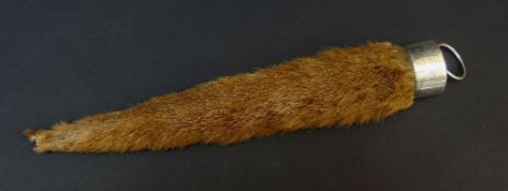 TAXIDERMY: SILVER-MOUNTED OTTER TAIL RUDDER (LUTRA LUTRA) mount with hallmarks for Chester 1925 by