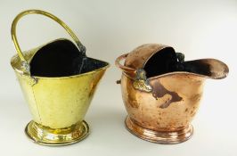 TWO EARLY 20TH CENTURY COAL SCUTTLES one copper helmet shaped scuttle and a brass Arts & Crafts