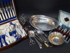 ASSORTED SILVER PLATE including an oak canteen for six place settings, boxed grapefruit spoons, oval