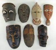 SEVEN VARIOUS AFRICAN MASKS including Tchokwe, Mbuti, Kuba and Mbole (7)