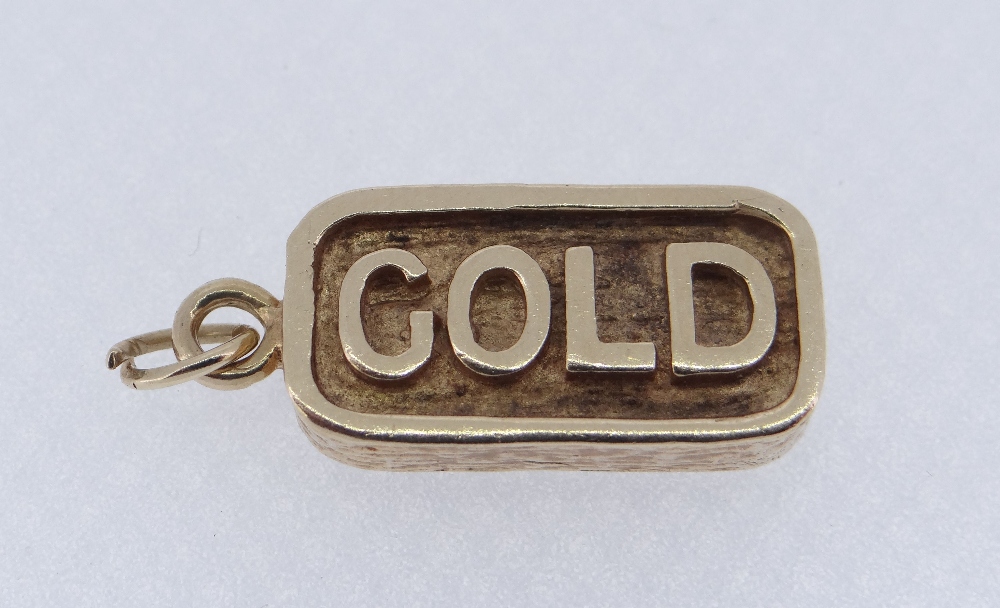 9CT YELLOW GOLD INGOT PENDANT MARKED 'GOLD', 6.1gms