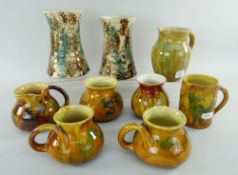 ASSORTED EWENNY TORTOISESHELL GLAZED VESSELS including pair of waisted cylinder vases, jug inscribed