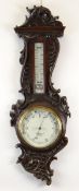 OAK CASED ANEROID BAROMETER, white porcelain dial signed Benetfink, Cheapside, London, rococo carved