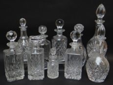 ASSORTED CUT GLASS DECANTERS (10)