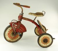 CHILD'S RALEIGH TRICYCLE IN RED WITH WHITE DETAIL, c. 1960's, 70cms long Condition Report: rust