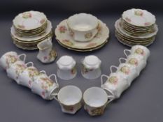 CONTINENTAL PORCELAIN, floral decorated teaware, 39 pieces consisting two sandwich plates, 12 side