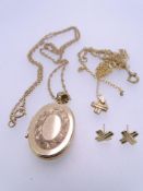 9CT GOLD LOCKET on fine link chain, pair of cross earrings and cross necklace (chain damaged),