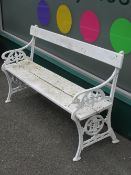 WHITE PAINTED GARDEN BENCH with decorative cast iron ends, 80cms H, 125.5cms L, 44cmsD