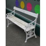 WHITE PAINTED GARDEN BENCH with decorative cast iron ends, 80cms H, 125.5cms L, 44cmsD