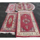 FIVE CHINESE WASHED WOOLLEN SCATTER RUGS to include a tassel ended rectangular example, 152 x 90cms,