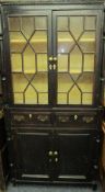 GEORGE III STAINED PINE WELSH FARMHOUSE CUPBOARD having twin upper astragal glazed 13 pane doors