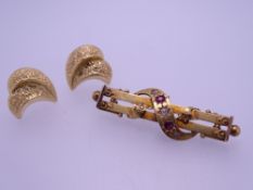 TWO 14 & 15CT GOLD ITEMS including a pair of 14ct gold earrings, 1grm and a 15ct gold Victorian